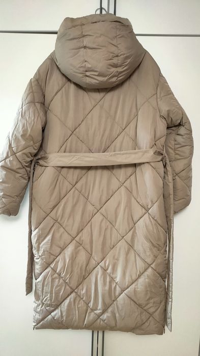 Продам пуховик новый