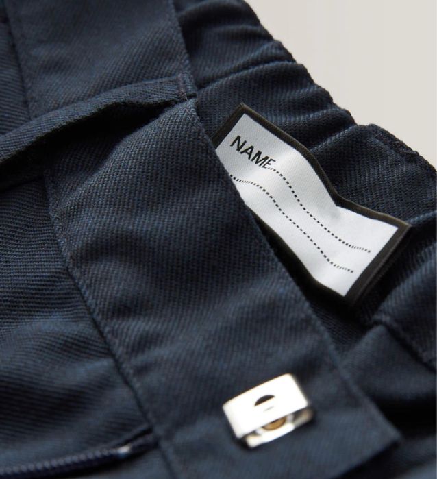 Продам новые школьные брюки Next