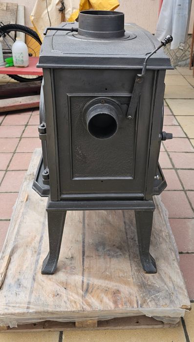 Чугунена камина - двулицева