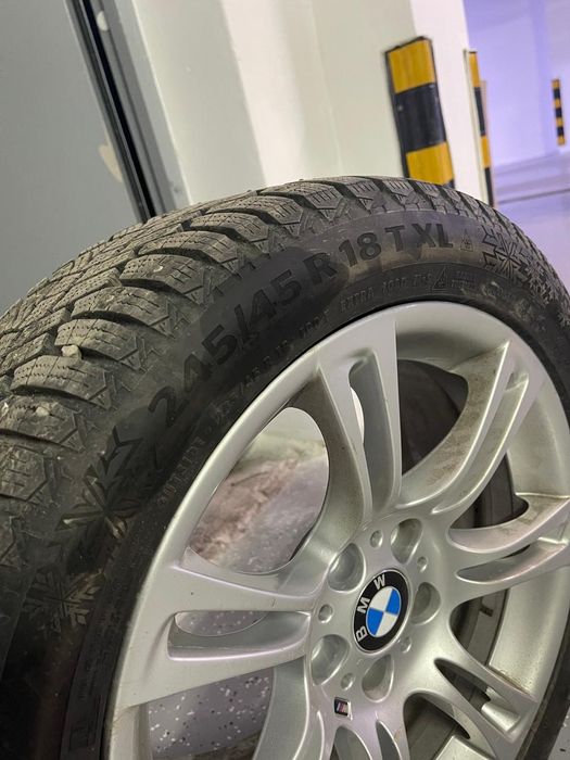 Продам шины с дисками 4 шт на BMW шипованные