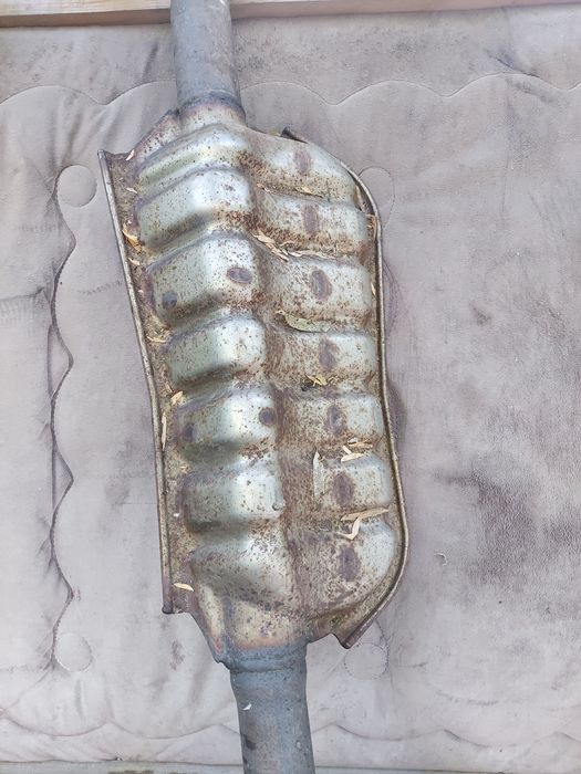 Резонатор на Subaru Outback 2009 год .