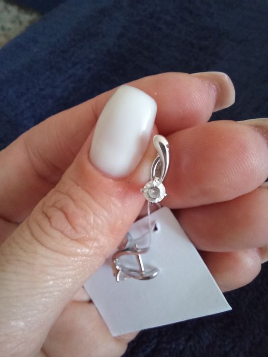 Продам серьги белое золото