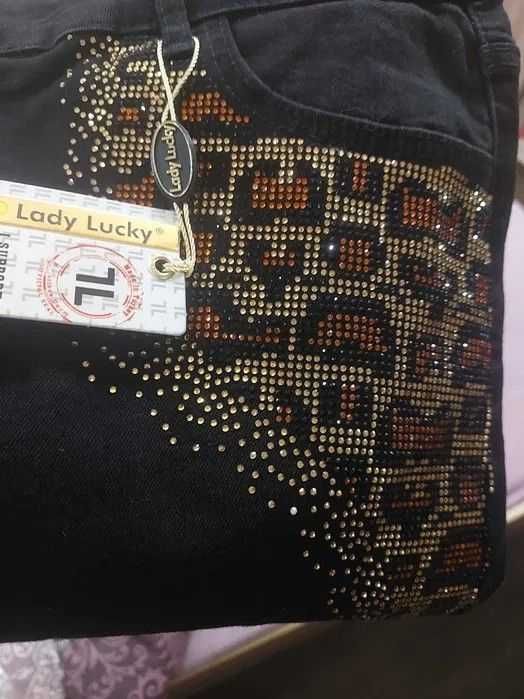 Брендовые джинсы со стразами на карманах разм. 52 Турция