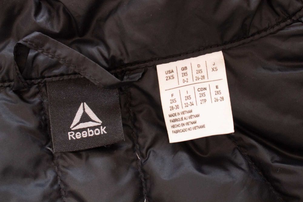 Reebok оригинална дамска грейка пухена елек черен с пух и пера XS