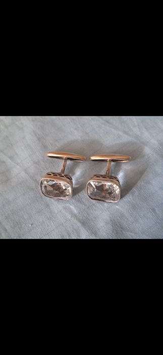 Запонки серебряные.