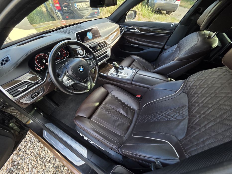 BMW 740d long g12  xDrive Facelift Individual Executive Lounge.40.000euro la schimb!
