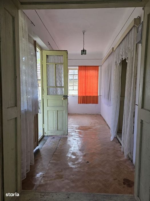 Casă cu teren generos