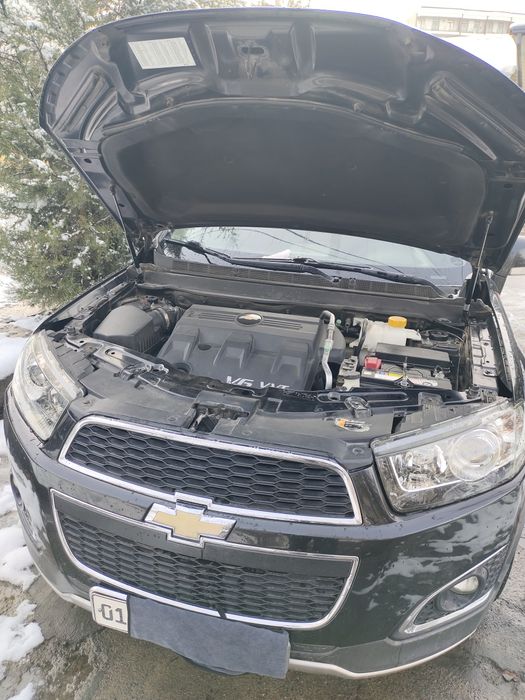 Captiva 2015 Y kraskasi toza xatto banferlayam toza benzinda avtomat .