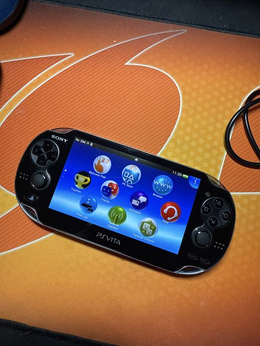 Ps Vita 1104 OLED 16GB, 7 игри, калъф, зарядно и адаптер за карта памет