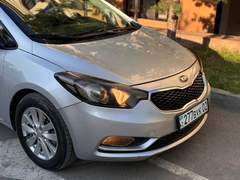 Kia Cerato 2013 года