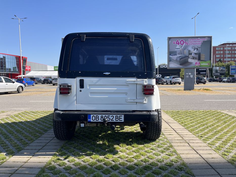 Jeep Wrangler TJ 2005 | 4.0 бензин/газ | Автоматик | 177 к.с.