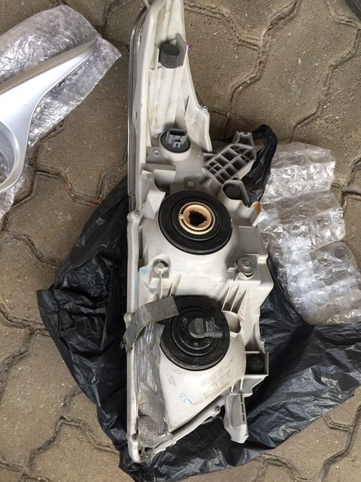 Фар Highlander джип Toyota;части амер.Ford