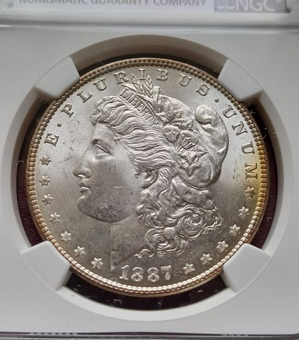 Монети от САЩ. Морган долар 1887 г. в грейд MS63 и MS64