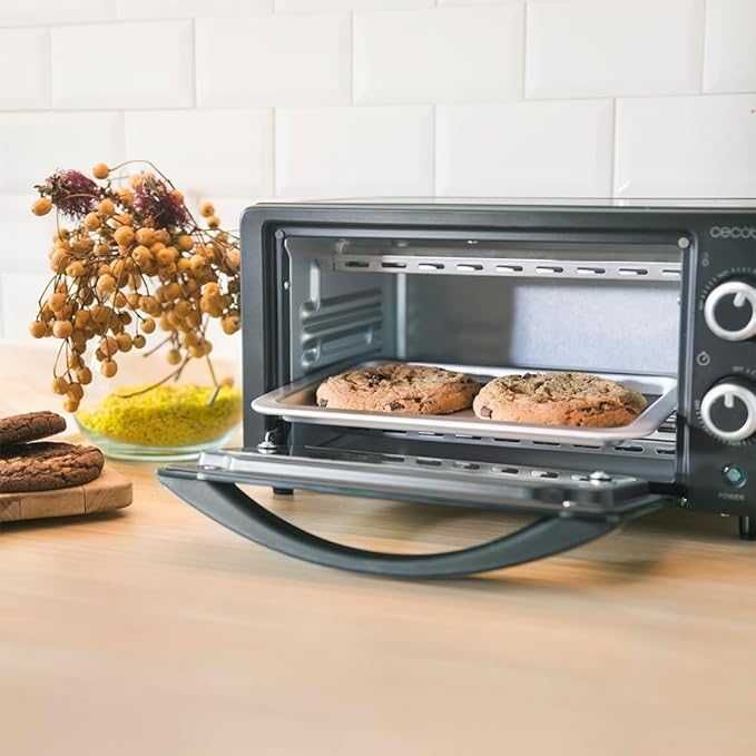 Мини фурна Cecotec Bake&Toast 1090, черна, капацитет 10 литра, мощност 1000 вата, контрол на температурата до 230 ºC, 60-минутен таймер, лек ДЕФЕКТ