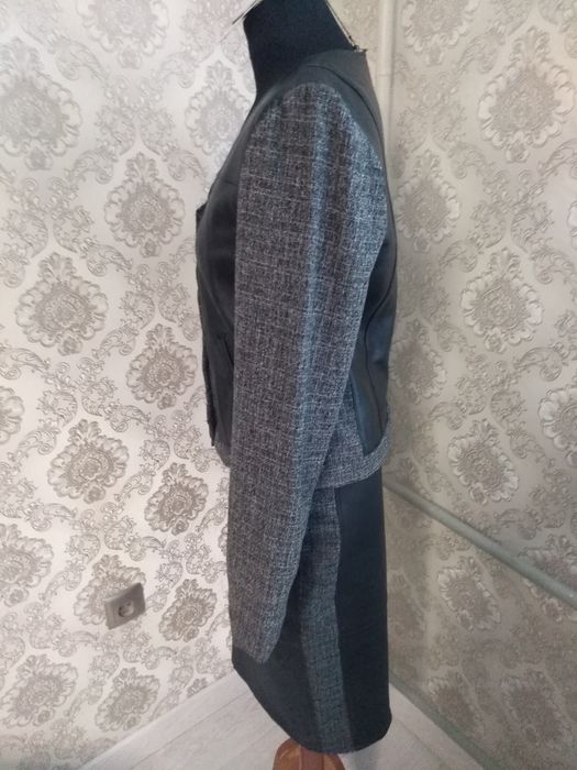 Кожаный костюм женский