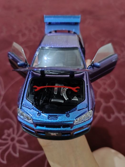 NISSAN SKYLINE 34 1:24 holati yangi