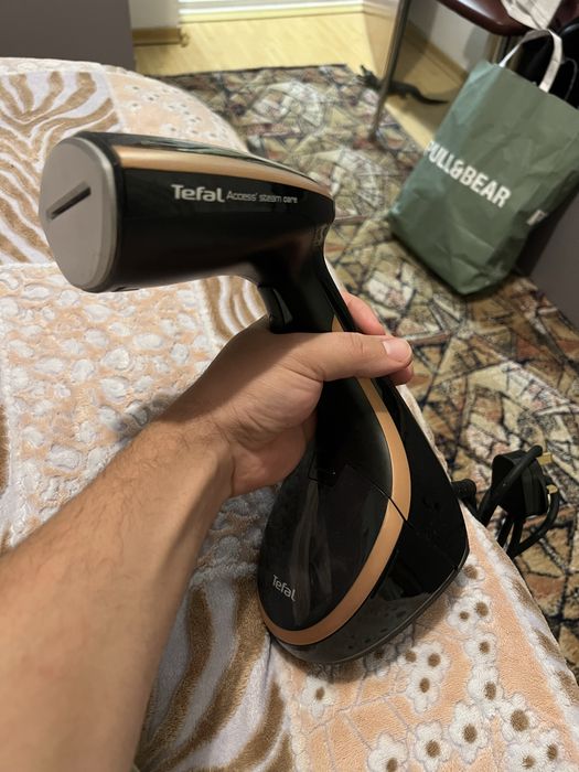 Fier de calcat vertical tefal