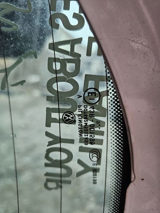 заднее стекло на Тигуан