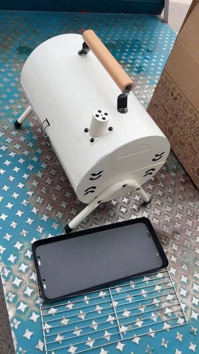 Складной двухсторонний уличный гриль для барбекю.