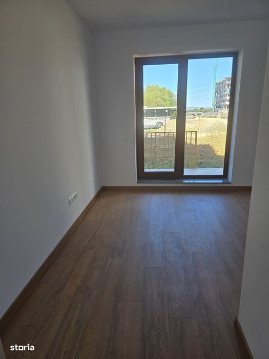 Apartament cu 2 camere , grădină 190mp + parcare