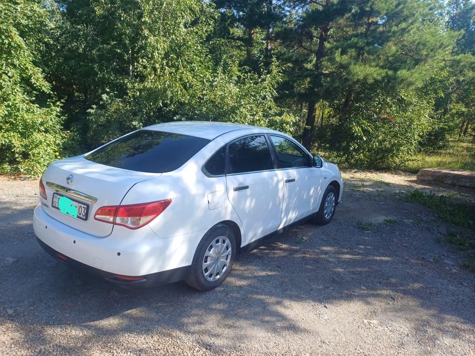 Nissan Almera 2014 1.6 л