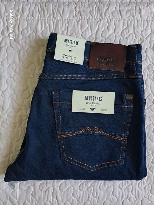 Vând blue jeans Mustang Washington. 
Toate detaliile sunt in poze. 
Vi