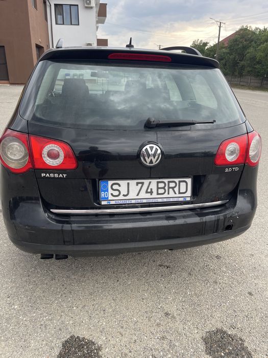 VW Passat B6 + două seturi de anvelope de iarnă (8 bucăți)