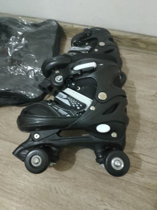 Роликовые коньки