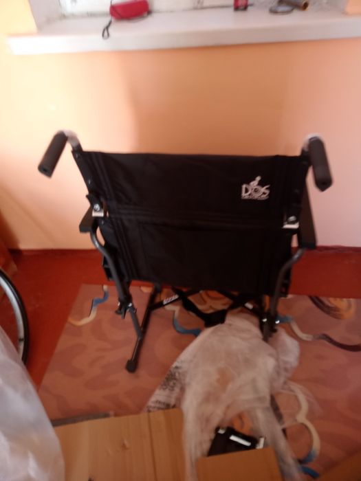 Механическая коляска