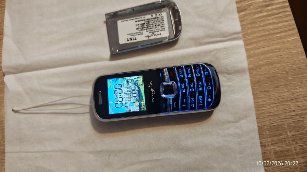 Mini telefon pentru spionaj