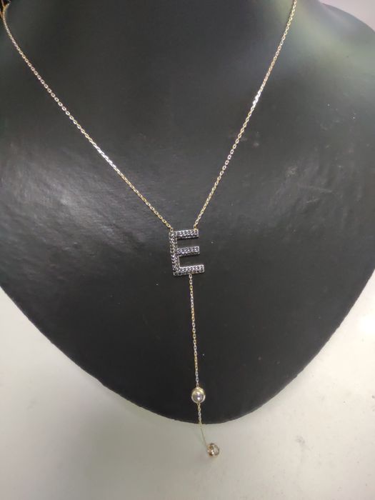 Lant initiala E (efn)