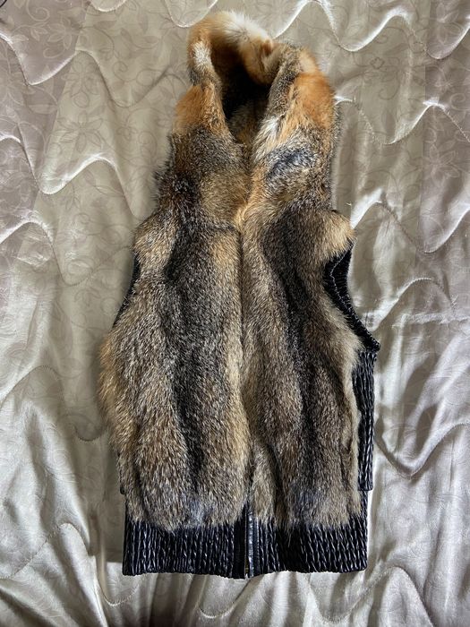 Меховая жилетка