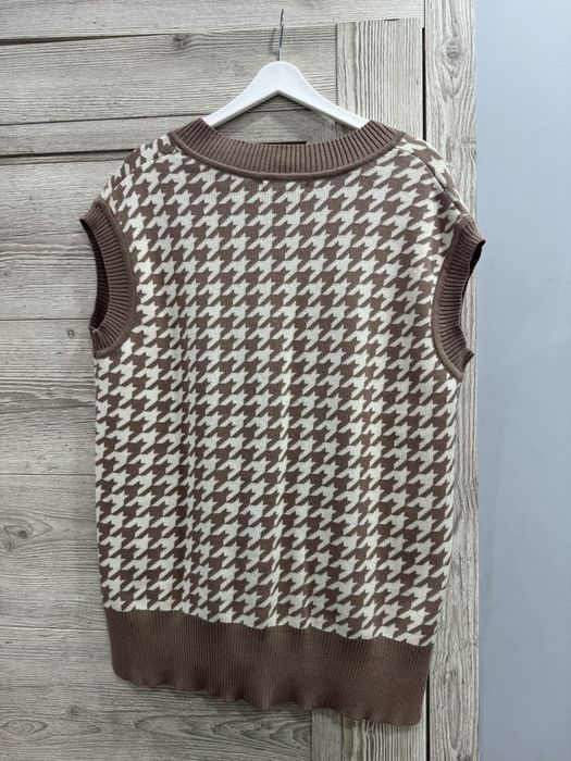 Модная жилетка