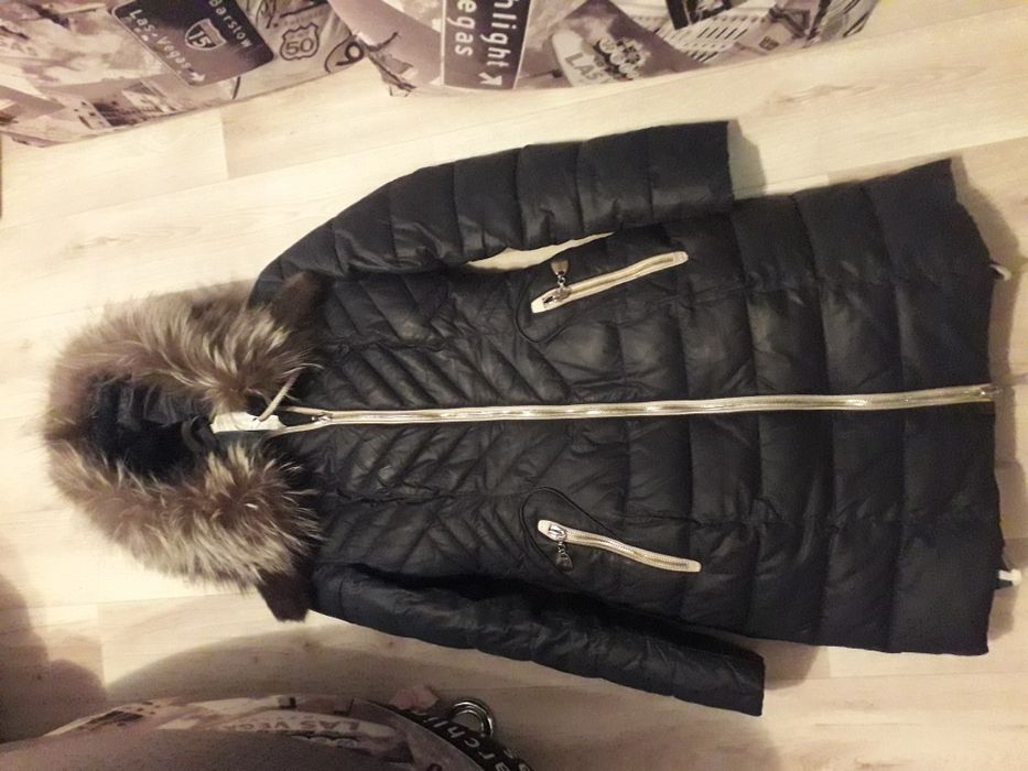 Продам зимний пуховик.