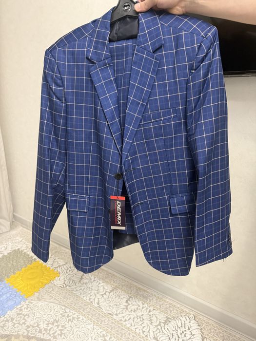 Продам костюм новый