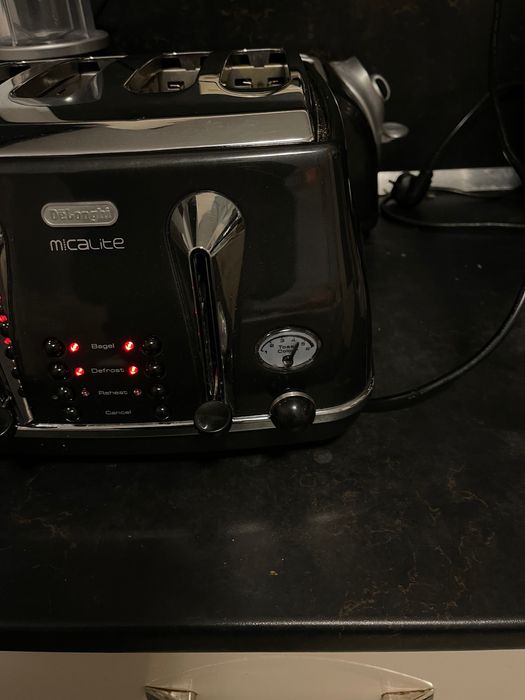 Тостер Delonghi с четири гнезда