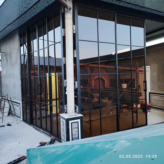 Стеклянные раздвижные лофт перегородки и двери