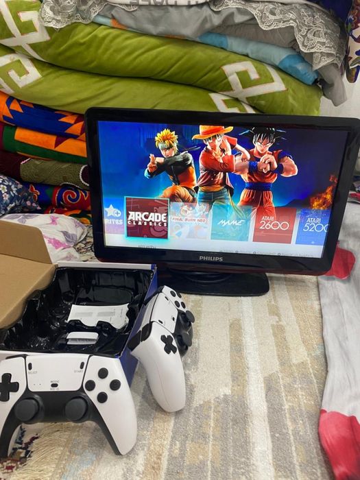 Продам приставку Game Stick pro 4K С телевизором