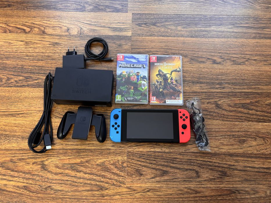 Nitendo Switch + 2 Jocuri