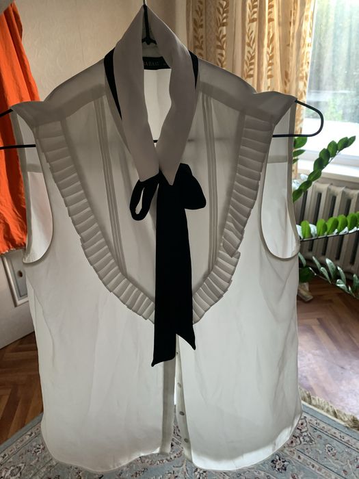 Продам брючный костюм для девочки