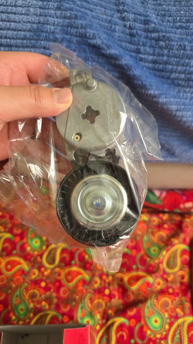 Натяжной ролик на камри