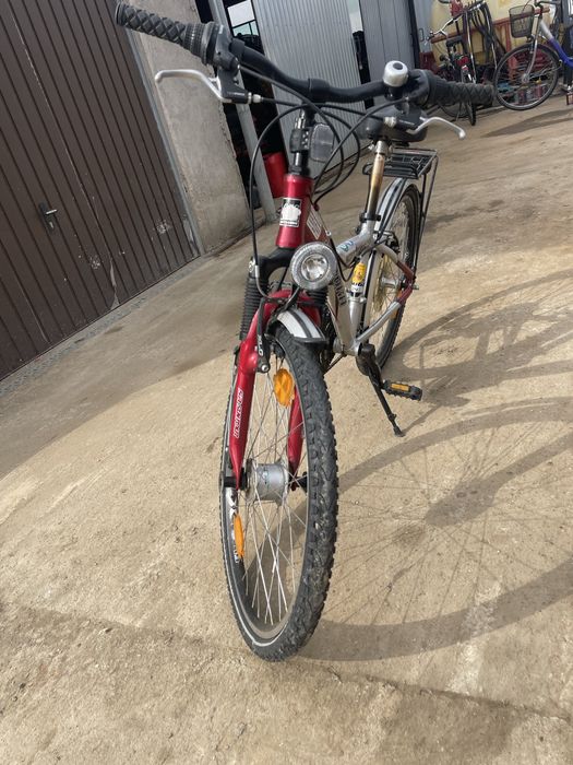 Vand o bicicleta de copi roti 24 ca noua aluminiu