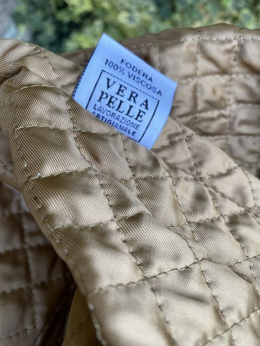 Новый кожаныый пиджак плащ куртка . Италия . Размер 52. L