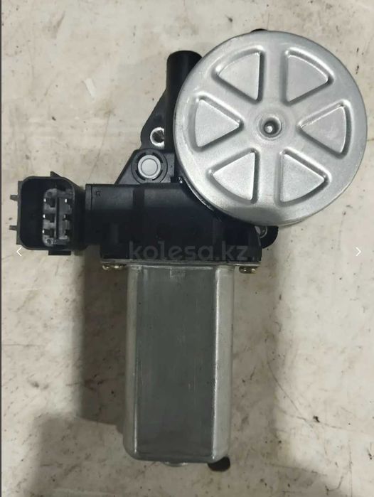 Моторчик стеклоподьемника Nissan