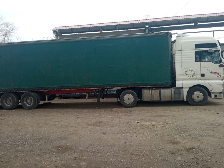 MAN тга сотилад 2003 .