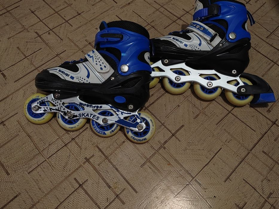 Роликовые коньки