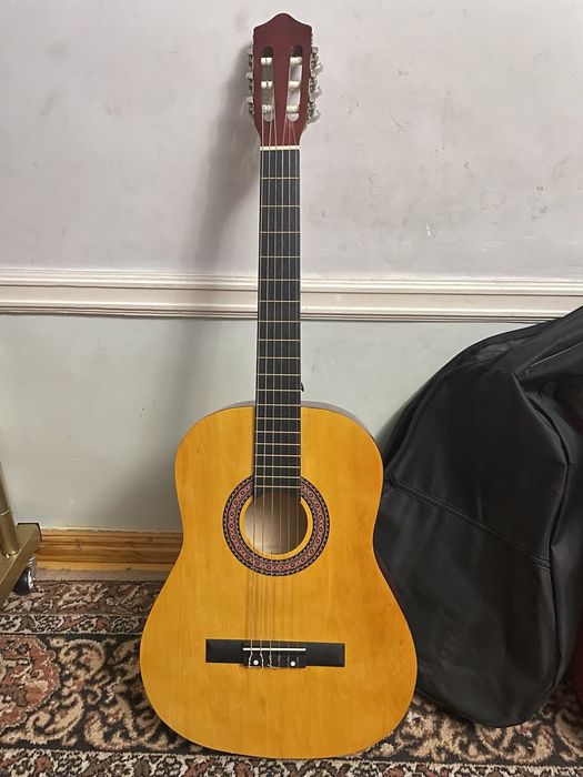 Gitara holati idelaniy taxtali