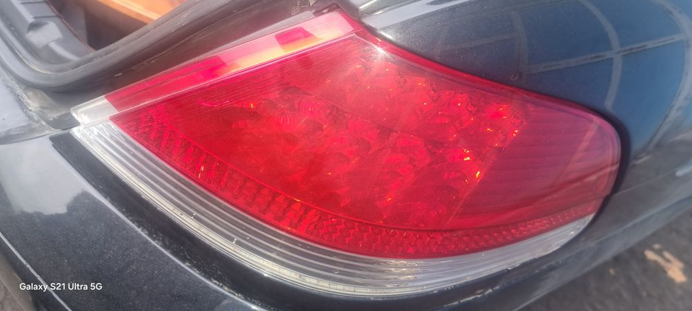 Продам на бмв е65 задний  фонарь