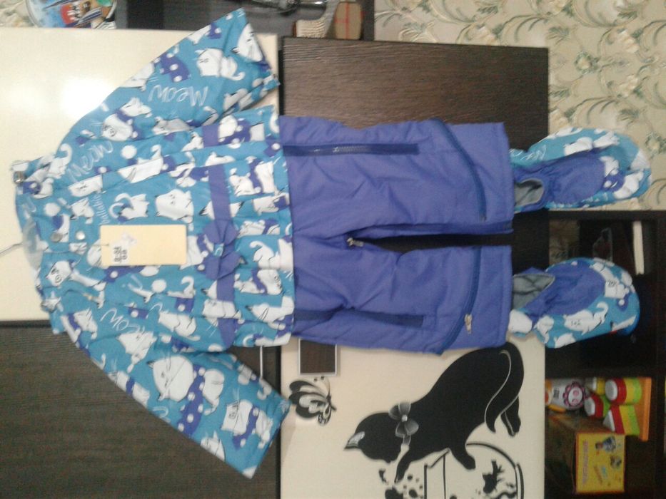 Продам демисезонный комбинезон