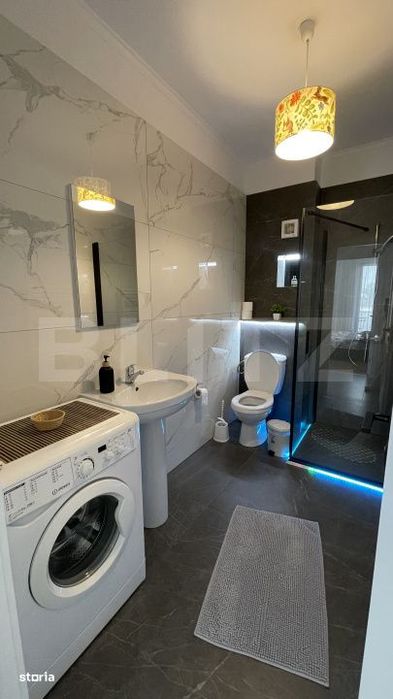 Apartament bloc nou, 72 mp, 2 dormitoare si living, parter, zona Nord